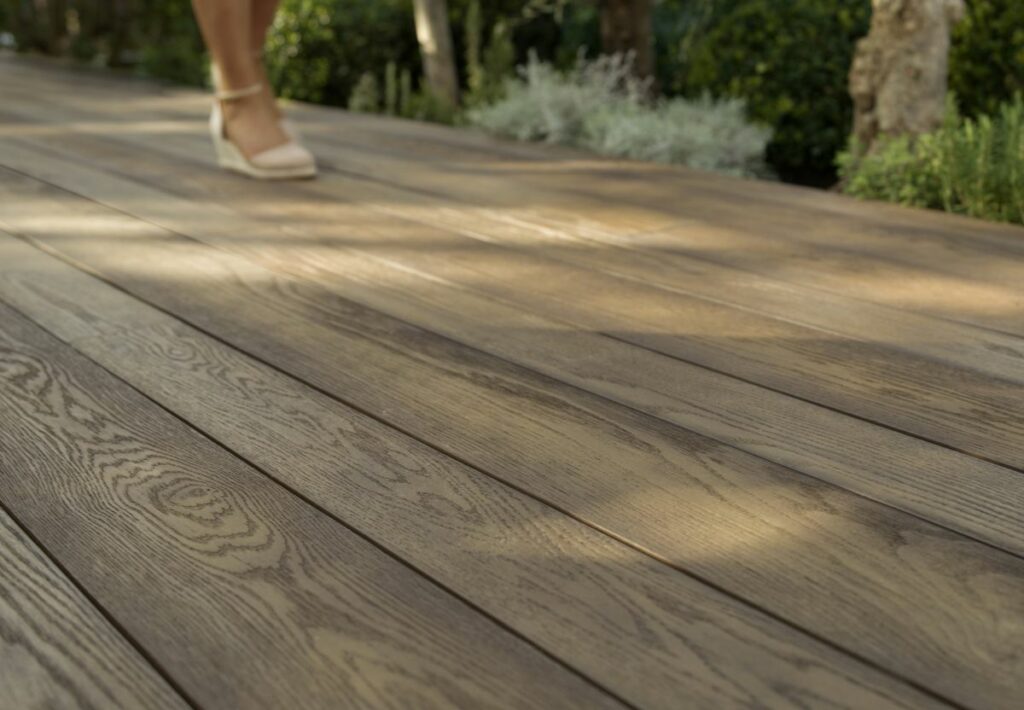 Composite decking using Millboard Golden Oak Enhanced Deck boards