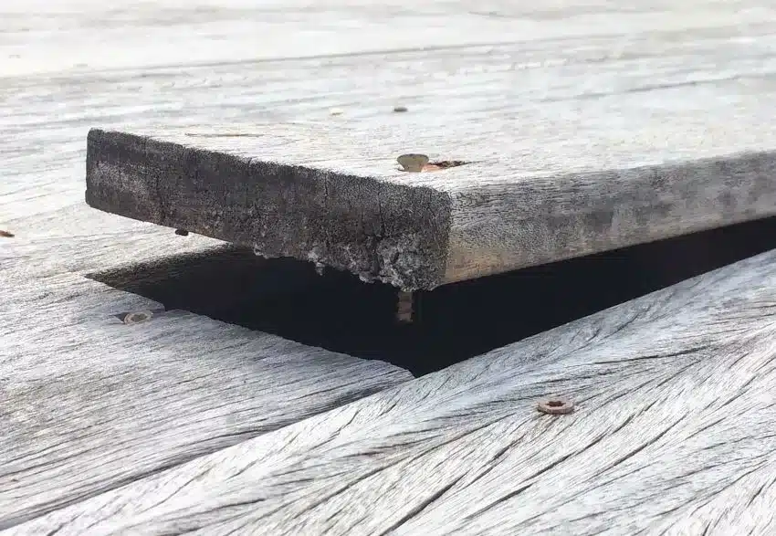 Cupped and damages timber decking