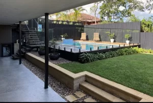 WoodEvi Pool deck with glass fence and Blacbutt staitcase